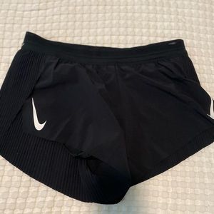 Black Nike running shorts